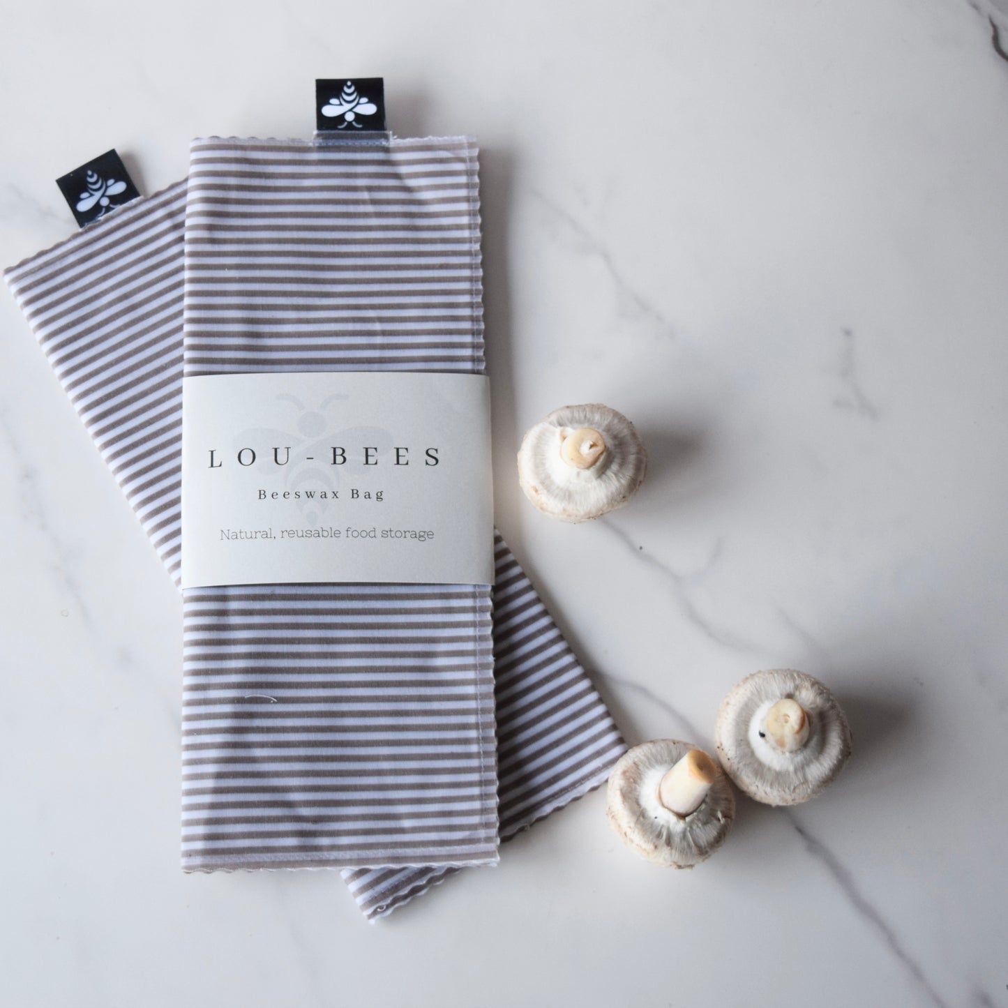 Lou-bees Beige Striped Beeswax Bag.